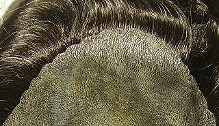 Parrucche e protesi di capelli umani dell'Azienda Meditoupee